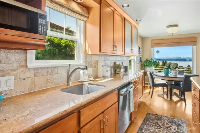 Custom cabinetry & slab surfaces and VIEW