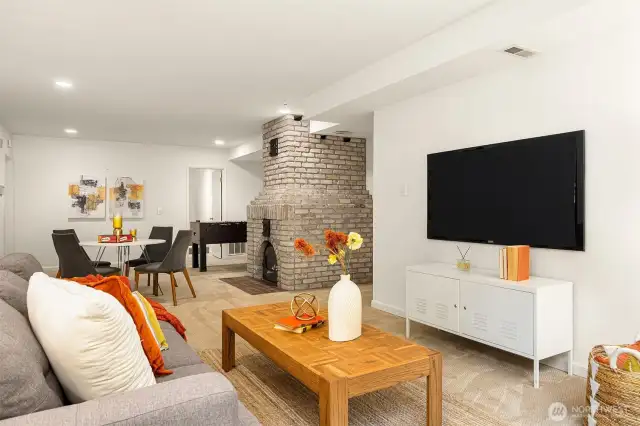 The lower level features a spacious bonus room with plenty of space for a media setup, games, or flexible living and entertaining.