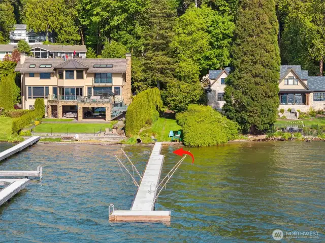 Shared by only six owners, this home’s designated slip is shown by the arrow. Enjoy access to the private, gated dock and grassy areas.