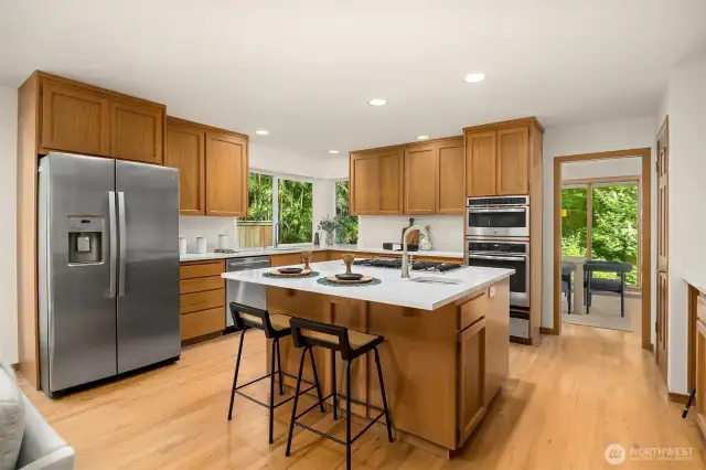Enjoy new appliances, including a fingerprint resistant stainless steel refrigerator (2022), new dishwasher (2020) in a kitchen with the ideal workflow space.