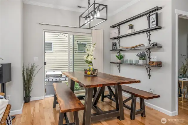Dining room as seen from kitchen. Access to yard beyond.