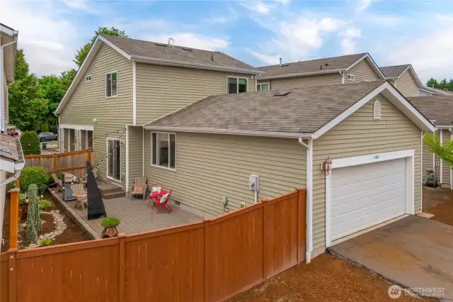 Back alley access to garage and driveway parking. Gate access to fenced yard.