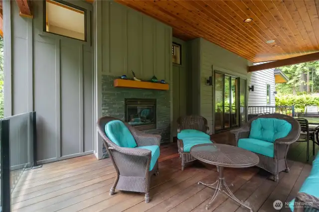 Beautiful covered outdoor area with gas fireplace for year round entertaining.