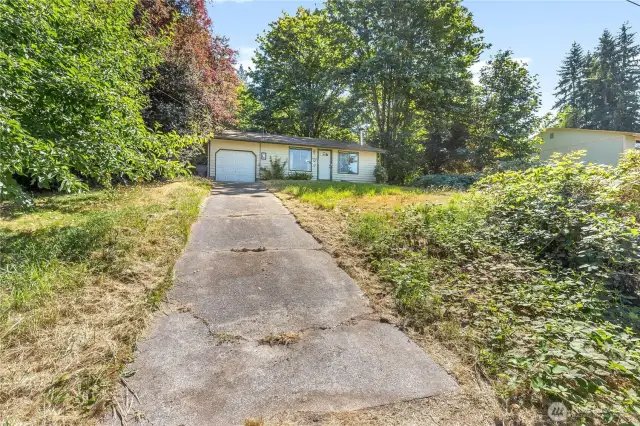 Long driveway for ample parking.