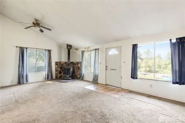 Wood burning fireplace in huge living room