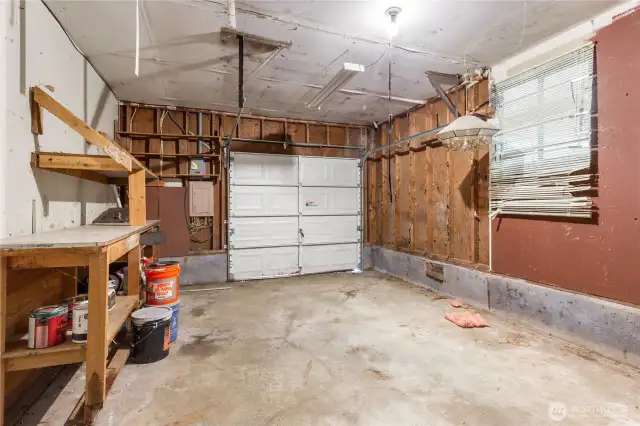 Workspace in large attached garage.