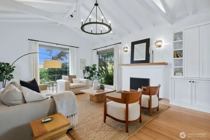 Soaring beam-ceilings greet you upon entry. The large windows bring in tons of natural light and offer views of the mountain and lake.