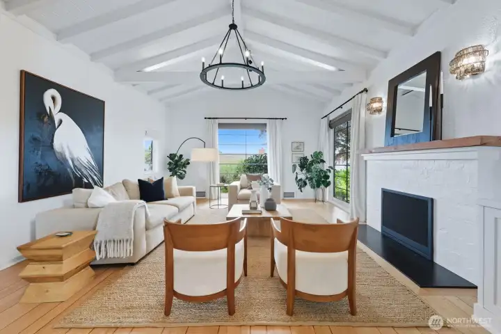 Beautiful inlaid hardwood floors, gas fireplace, and space to entertain.