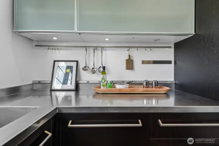 This kitchen is designed for chef's!  So much storage in all the cabinetry that capitalizes on space.
