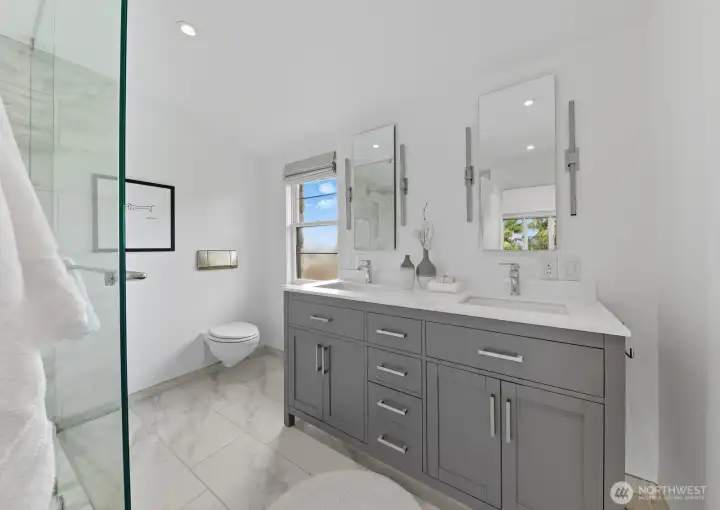 Primary en suite features heated floors and a walk-in closet.