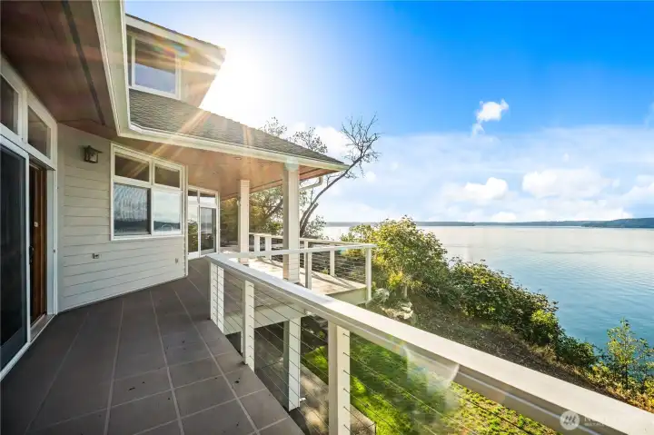 Waterfront home with expansive wrap around deck allow you to enjoy the view all year around.