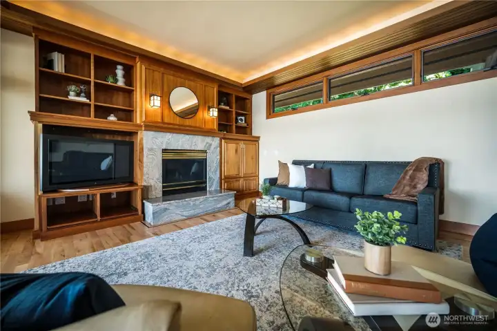 Living Space on main level of home with custom woodwork and built ins.