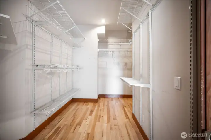 Primary closet which wraps around