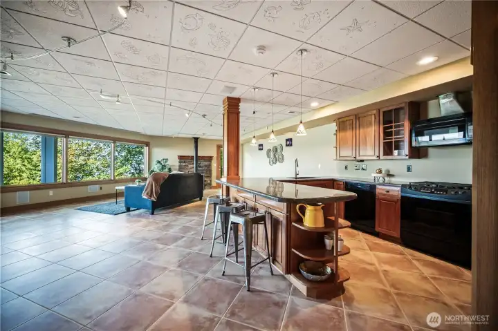 Full kitchen with bar area downstairs.  Separate entrance also allows this to be a great second living space or rent income potential