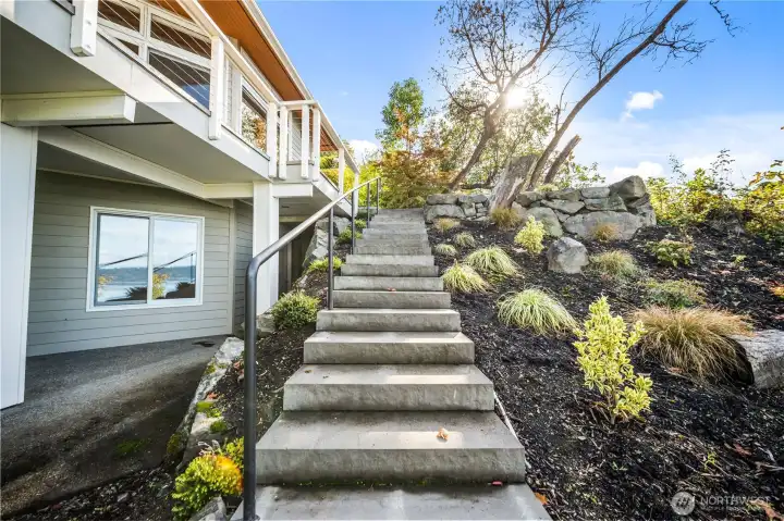Steps from downstairs covered patio area to upstairs deck.  Perfect for entertaining