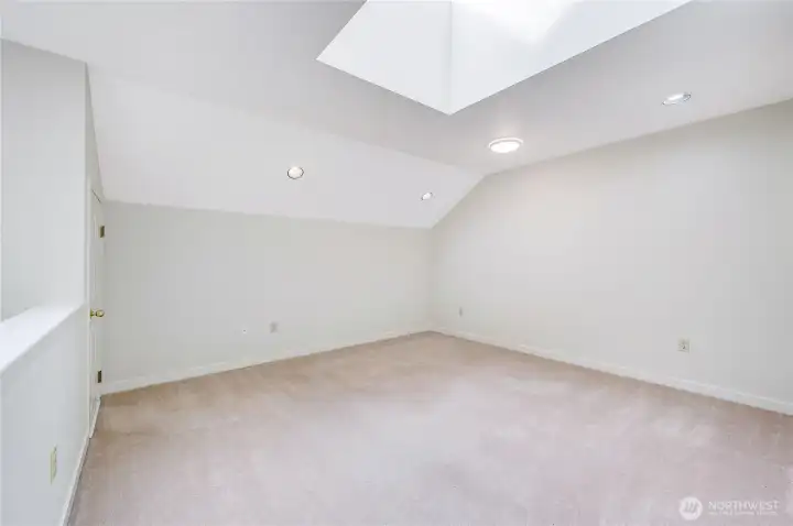 With fresh paint, skylights, intriguing architectural angles, and a spacious closet, this loft offers endless possibilities.