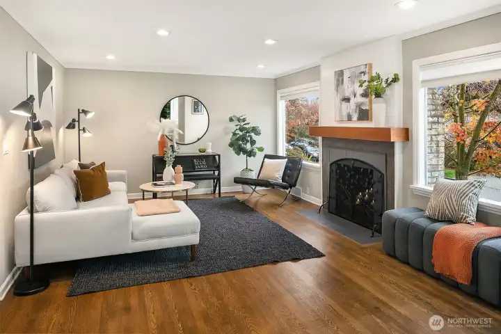 Upon entering, note the rich hardwood floors and abundant natural light.