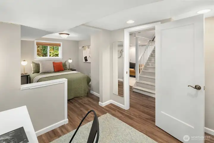 One of two lower level bedrooms. This room has two separate areas, one for sleeping and another for play or study. This bedroom may be non-conforming. Buyer to verify.