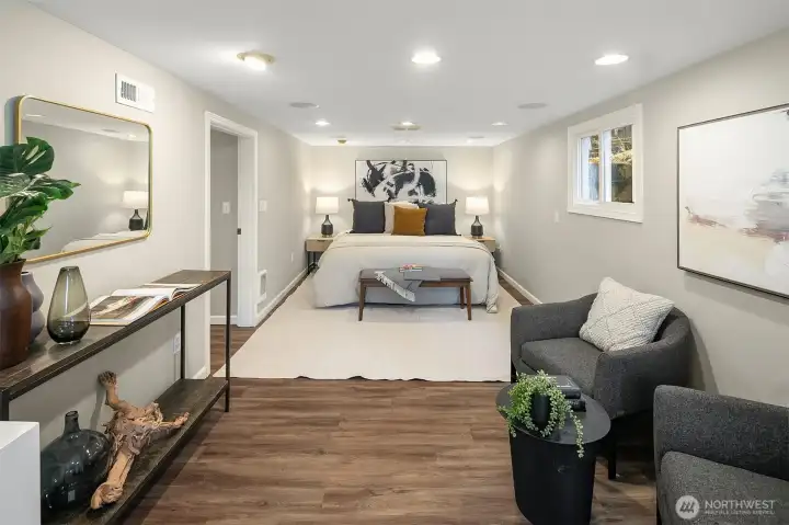 This room has so many potential uses! It could make a wonderful recreation room, home office, or even a rental space.