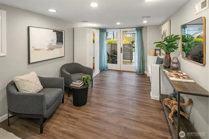 Another view of the large lower level bedroom/flex space. With its own private entrance, it makes a great home business. It has been used as a hair salon and a music studio.