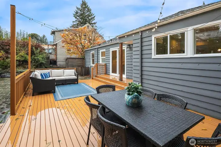 The back deck off the main living area has plenty of space for entertaining.