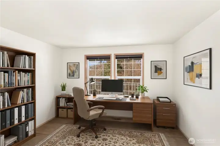 Flex room virtually staged as an office.