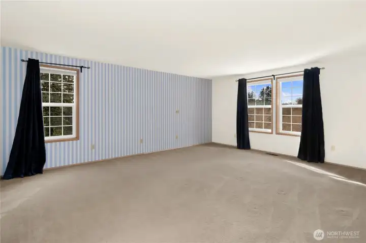 Upstairs primary bedroom with lots of light and room for all the furniture you want.