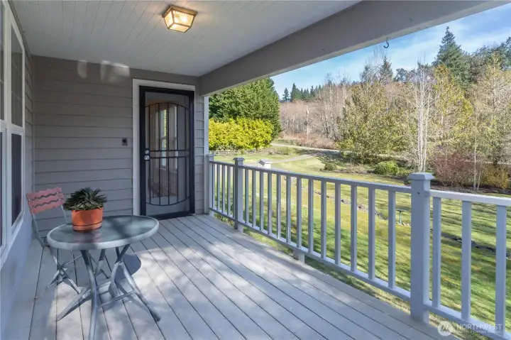 Covered porch to enjoy your morning coffee.