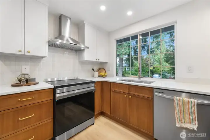 Picture window to backyard and deck.