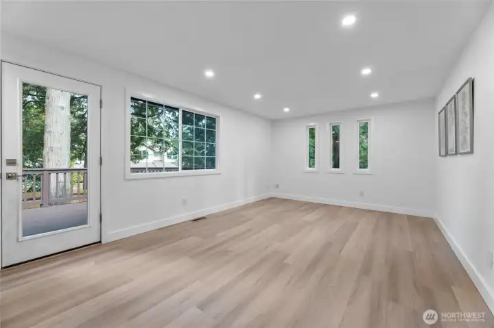 Inviting family room off kitchen with door to back deck.