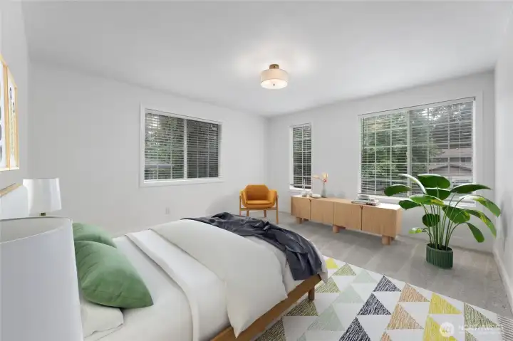 Enter the Vrtually Staged Primary Bedroom Upstairs