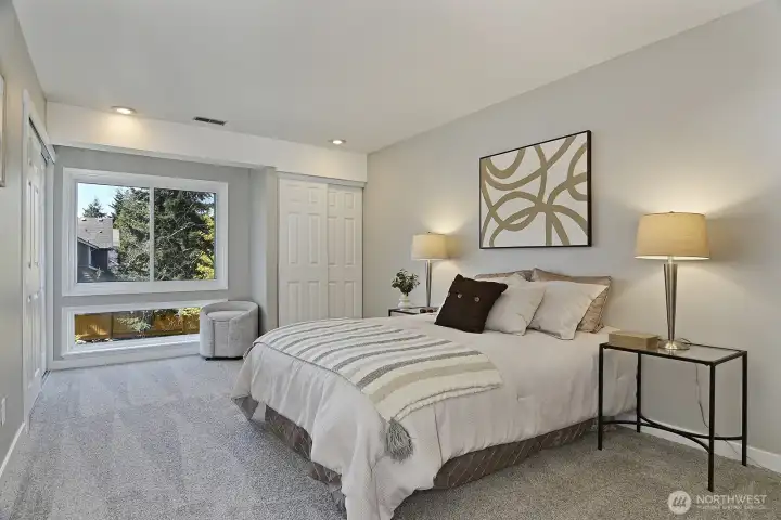 Spacious Primary bedroom with a private three quarter bath