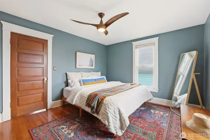 Large + bright bedroom.