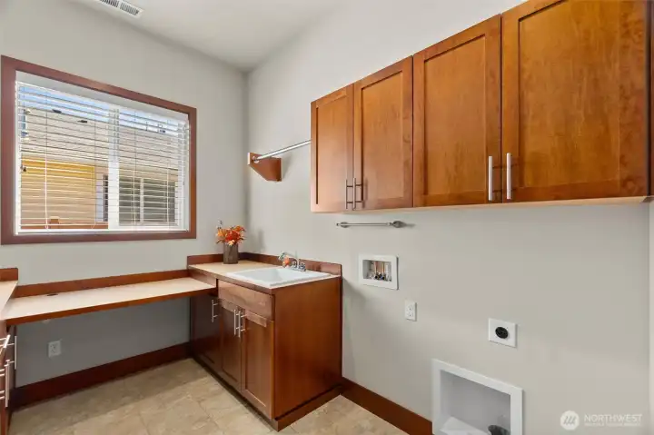 LARGE laundry area w added storage