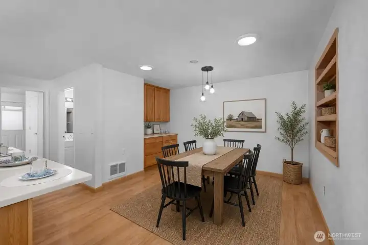 Virtually staged kitchen eating space - complete with built-ins