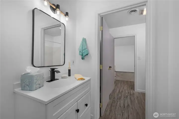 1st guest bedroom with private sink.