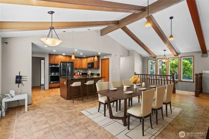 This shows thru Virtual Staging The Dining area and sit-up breakfast bar.