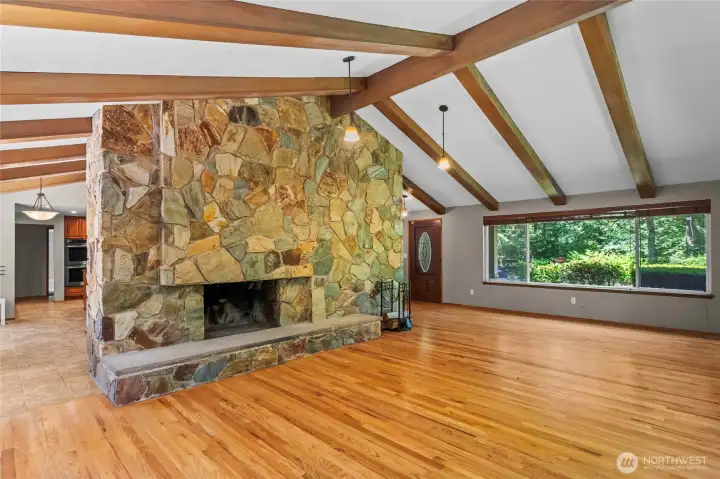 Upstairs Living Room with amazing wood beam ceilings and working fireplace