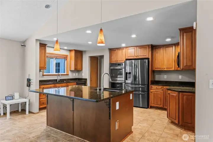 Great Kitchen with Island and tons of counter space,Two sinks and stainless Appliances.