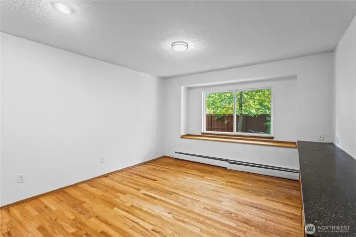 Upstairs with with tons of natural light and built ins for storage