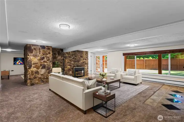 Lower Level with Large Bonus room and French doors leading out into Back yard.Virtually Staged