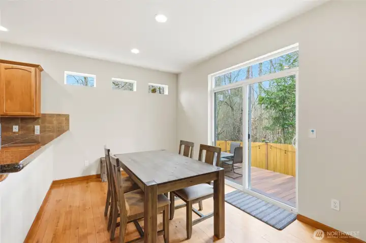 Dining room opens from kitchen to the private patio. Dining room opens from kitchen to the private patio.