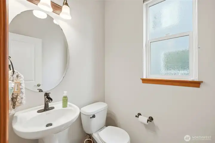 Half bath on main floor is perfect for guests. Half bath on main floor is perfect for guests.