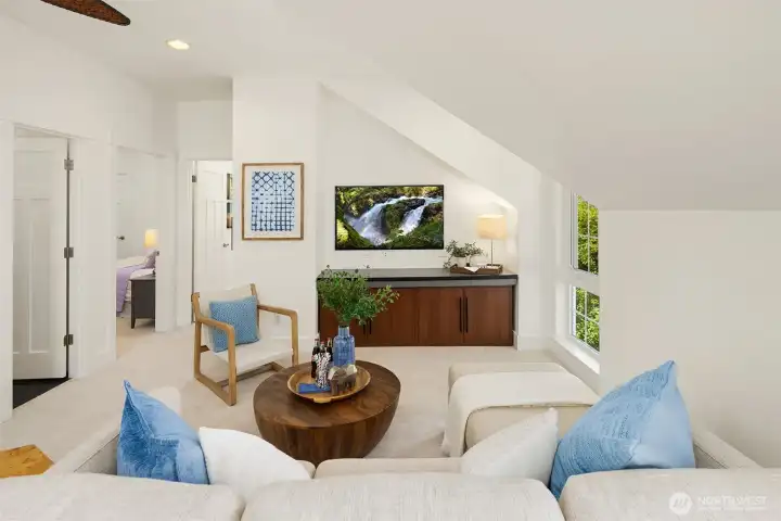 The vaulted upper-level bonus room opens to a west-facing rooftop deck, creating a light-filled retreat for movie nights, work-from-home flexibility, or sunset lounging above the trees.