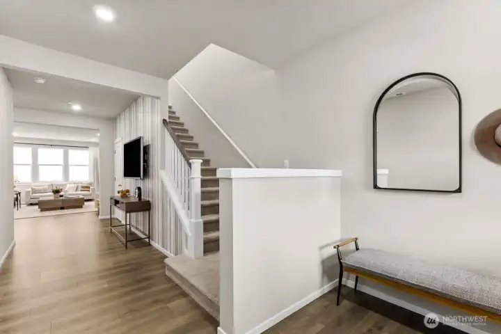Photo rendering is representational and may be virtually staged. Actual home is under construction and finishes, elevation, and paint colors may vary. See site agent for details.