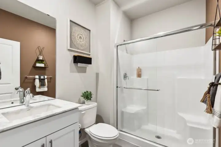 Photo rendering is representational and may be virtually staged. Actual home is under construction and finishes, elevation, and paint colors may vary. See site agent for details.