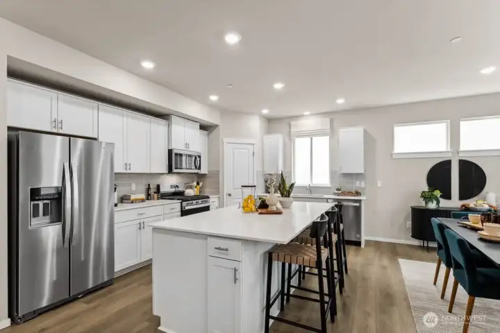 Photo rendering is representational and may be virtually staged. Actual home is under construction and finishes, elevation, and paint colors may vary. See site agent for details.
