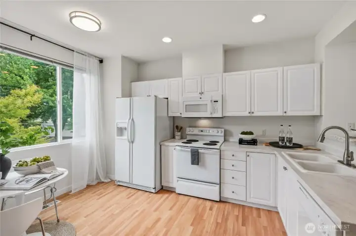 Lots of cabinetry and even room for a breakfast table!