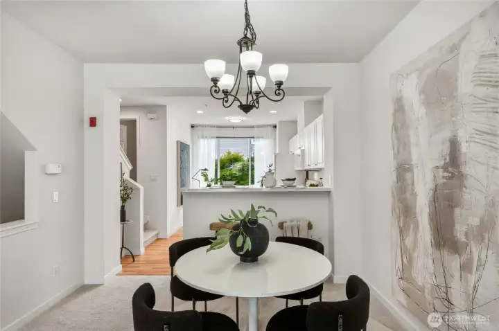 Note the stairs up from the entrance level and a half bath off the landing going upstairs.