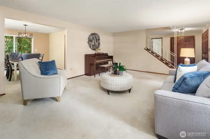 Living room opens to dining room. Living room opens to dining room.